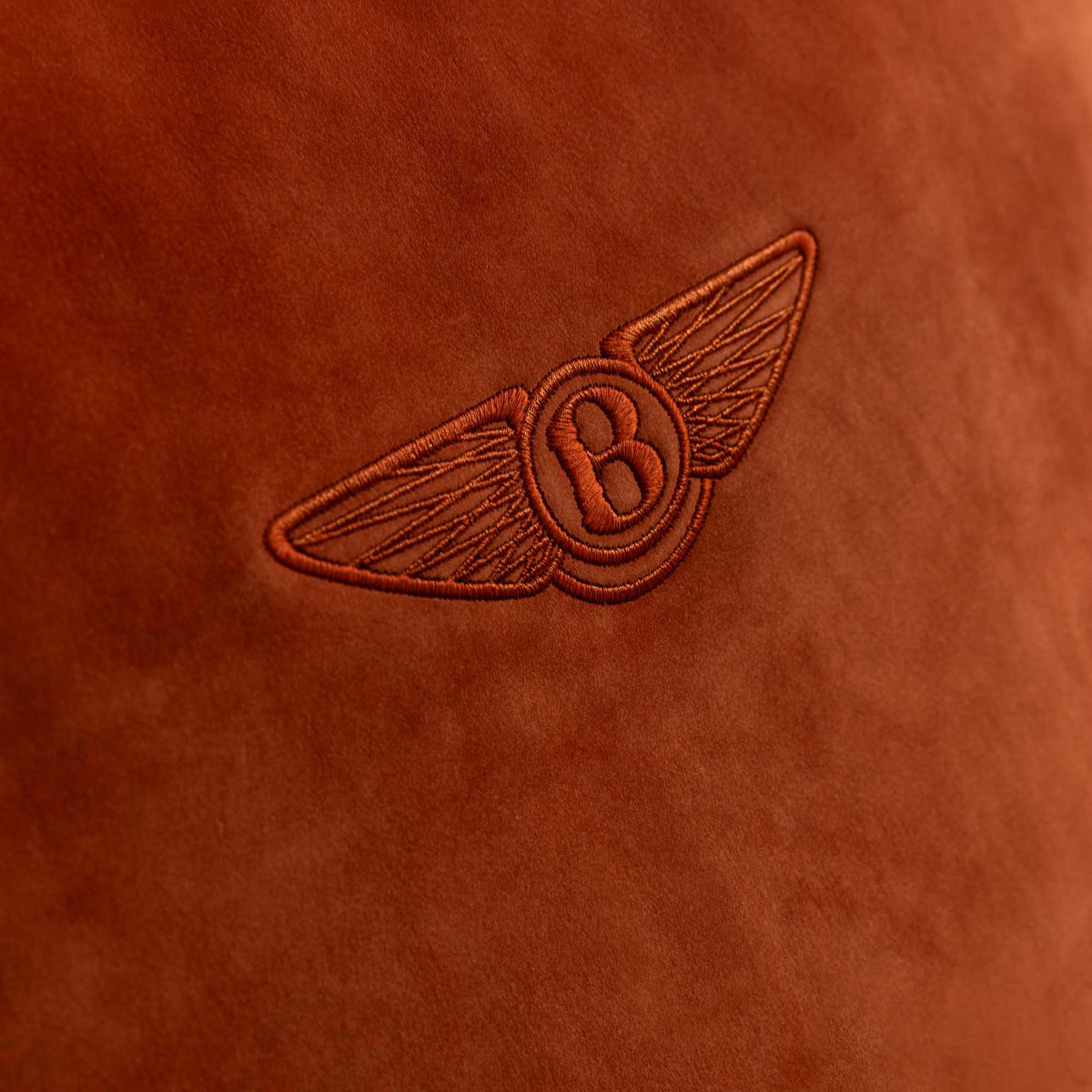 Butterfly sofa logo detail by Bentley Home